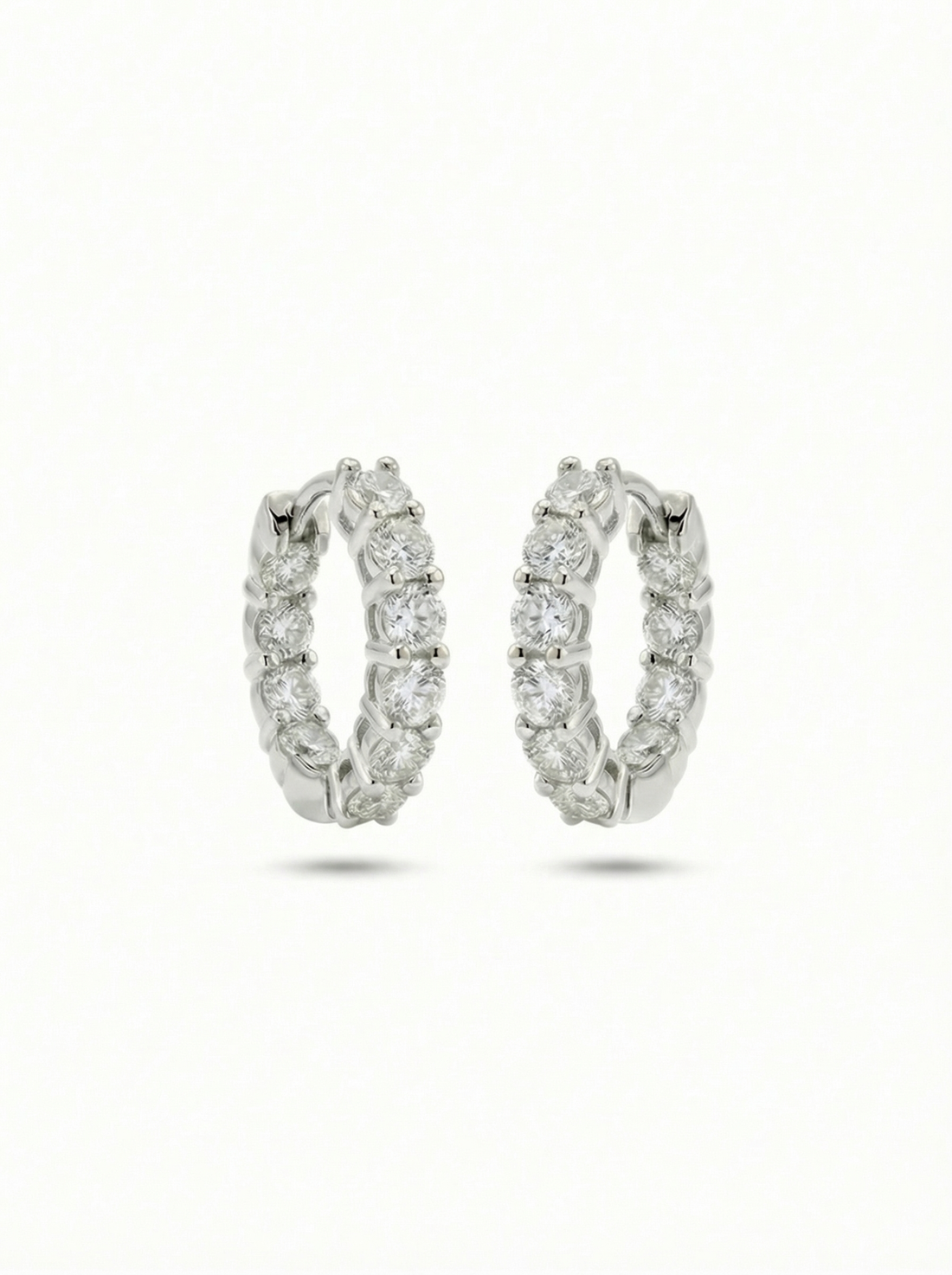 Round Cut Moissanite Huggie Hoops in Gold